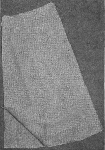Fig. 194. Pinning a straight and bias edge for basting.