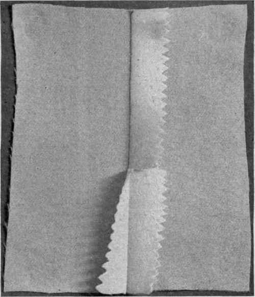 Fig. 212. Cloth seam, stitched, pinked and pressed together or open.