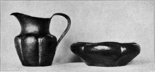 Fig. 100. Pitcher with flat handle and bowl.