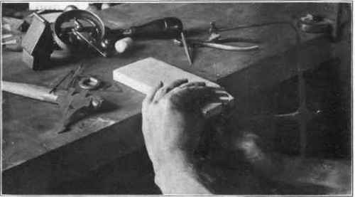 Fig. 30. Position of hands and saw frame while saw piercing .