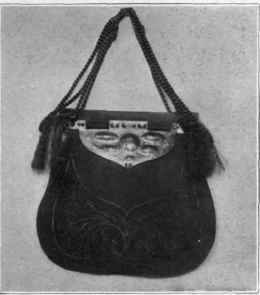 Fig. 35. Bag with hammered copper top.