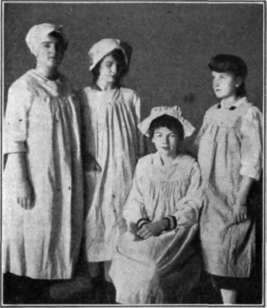 Fig. 24. Four of the Pleasant Valley girls wearing their finished aprons.