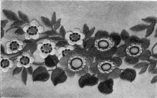 AN ENLARGED SECTION OF THE CENTREPIECE.