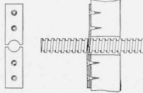Pieces of Strap Iron Shaped to Fit the Square Thread Make a Good Substitute Nut