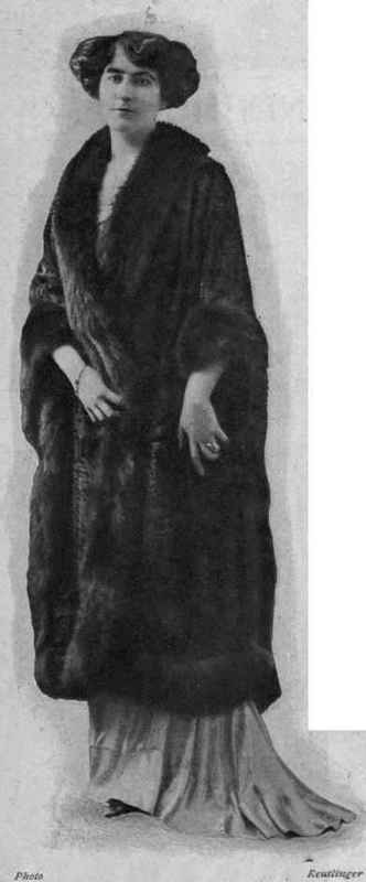 A becoming wrap in otter and skunk. Skunk is at present much in vogue. It needs no dyeing, and is of great durability