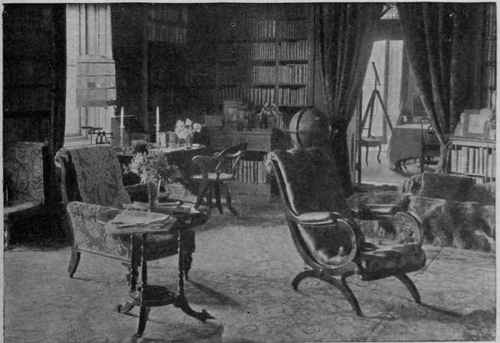 A charming library, filled with that atmosphere which a scholar alone can create, and yet a homely room, filled with flowers