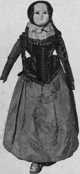 Early Victorian doll, face of wax, glass eyes, human hair, kid arms and hands, shot brown striped silk skirt, black velvet bodice