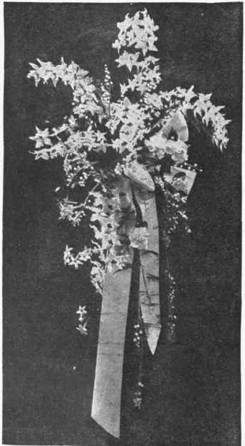 The fashionable bride's bouquet is much smaller thanl it was in former times