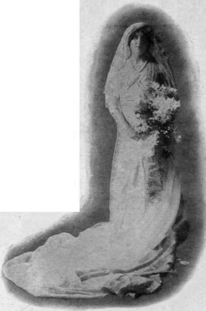 Miss Drexel on her marriage with Lord Maidstone wore a superb gown of white satin, draped with lace, with a Court train of gold brocade