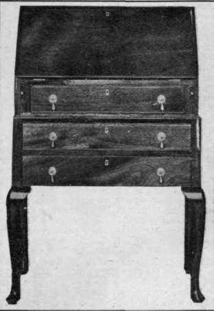 A Queen Anne bureau in walnut with cabriole legs is quaint and charming