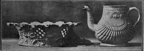 An 18th century Staffordshire salt glazed teapot, without cover, pecten shell pattern, and basket'shaped tray of the same ware, with