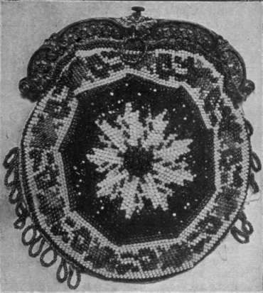 Fig. 3. A design that is over a century old, executed in cut ruby and white beads, and finished with a fringe of fine gold beads