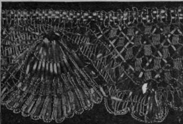 Lace made of silver threads, the pattern simple to allow for the stiffness of the metal. Early 19th century French work