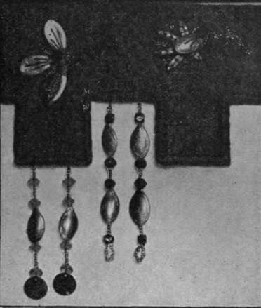 No. 3. Gilded marrow and melon seed. worked with green and gold glass beads, are quaint in their effect