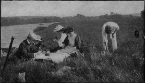 Tea on river bank. One half of the attraction of a picnic depends on the daintiness of the fare provided
