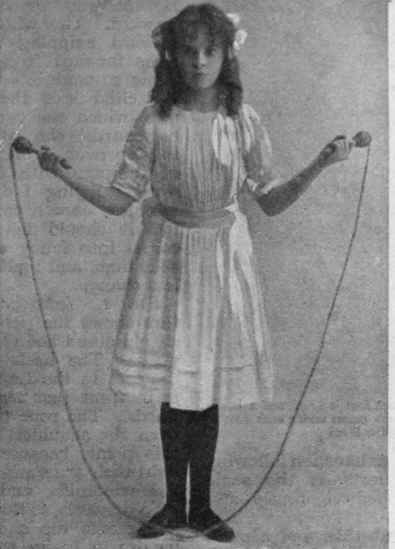 Fig. I. The Introductory position, with heels together and rope in front. The rope must be turned from the wrist, not the shoulder