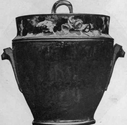 Ice pail, in Pinxton porcelain, with a canary ground ornamented with scroll gilding. The frieze of beautifully painted flowers and foliage is said to be the handiwork of William Billingsley