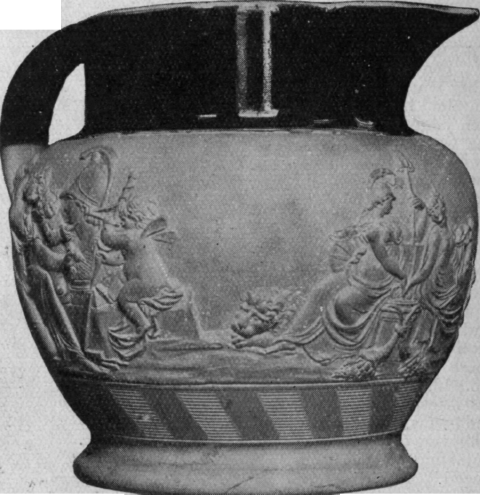Jug in cream coloured ware, partly glazed brown, moulded in relief with groups representing Painting, Music, and Sculpture. Such jugs were frequently mounted in silver, and are of exquisite workmanship