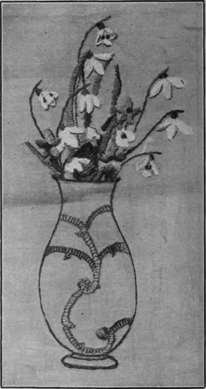 Snowdrops and violets make a delicate and harmonious filling for a vase design. The flowers should be worked in their natural colours, the vase in Wedgwood blue