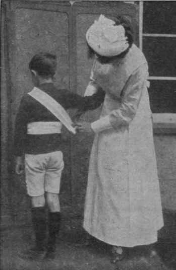 The bandage is next carried across the shoulder, down the back to the starting point, and again round the waist