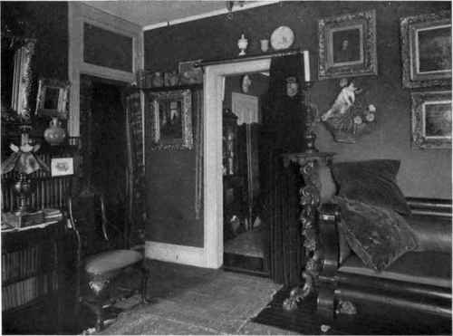 ONE PARLOR HAS BEEN TREATED IN GREEN AND WHITE