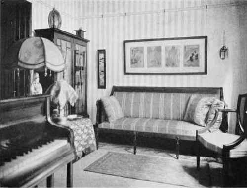 THE RECEPTION ROOM OF A PHILADELPHIA APARTMENT WITH MAHOGANY FURNITURE.