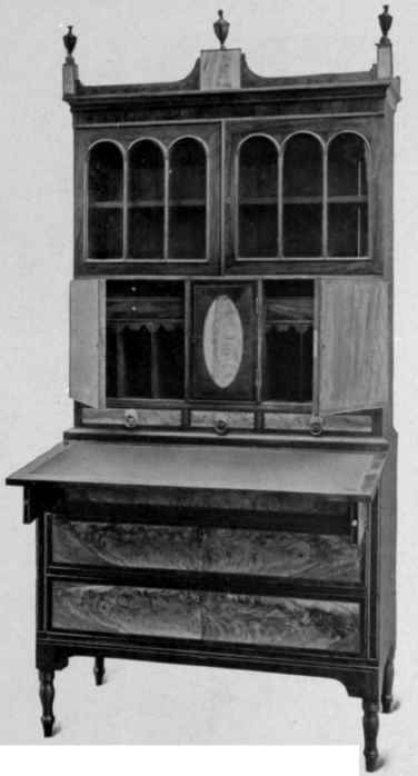Inlaid Writing Table with bookcase top, about 1800.