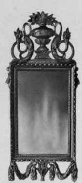 Looking Glass with carved and gilded frame, about 1780.