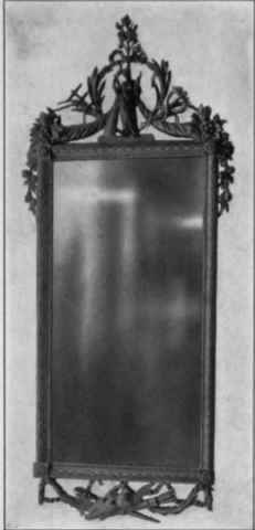 Looking Glass with carved and gilt frame, 1785 95.