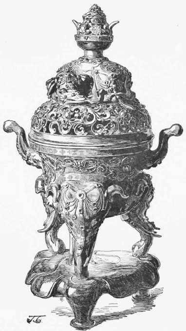 Perfume or Incense burner, in bronze, studded with precious stones, upon a stand of carved iron wood.