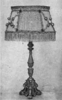 I. Wood standard, finished in antique gold; French silk shade; at $ 75.