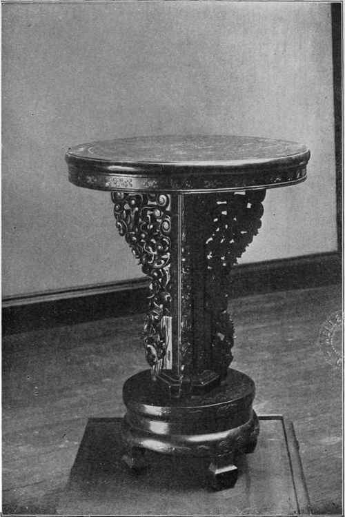 CARVED CEDAR TABLE.