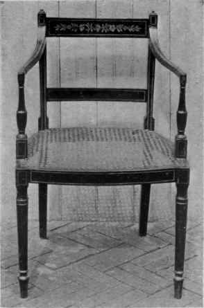 PAINTED CANED SEAT SHERATON ARM CHAIR, VASE BALUSTER ARM SUPPORTS.