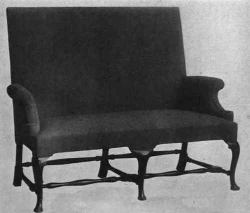STRAIGHT TOP UPHOLSTERED QUEEN ANNE SETTEE.