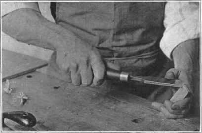 Fig. 33. Slicing off an arris with a chisel.