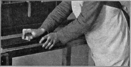 Fig. 100. Method of Grasping Sandpaper.