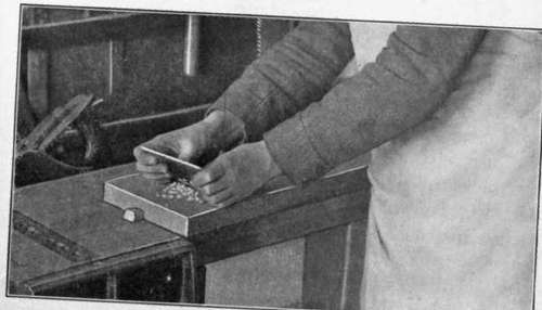 Fig. 59.   Method Of Grasping Scraper The Scraper When Working Within A Small Area.