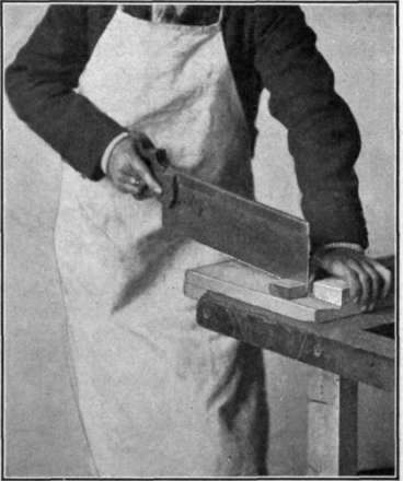Fig. 88. Use of the Bench Hook and the Backsaw.