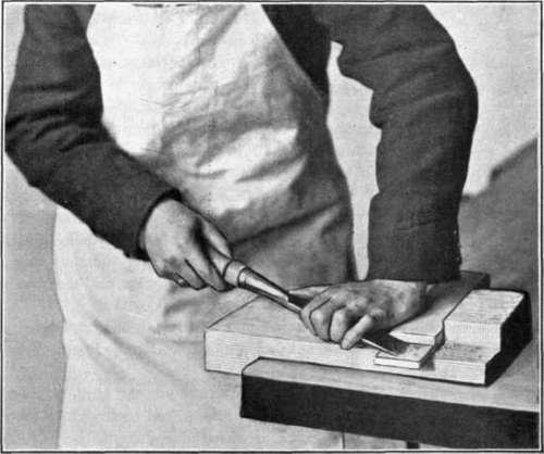 Fig. 90.   Use of the Bench Hook with the Paring Chisel.