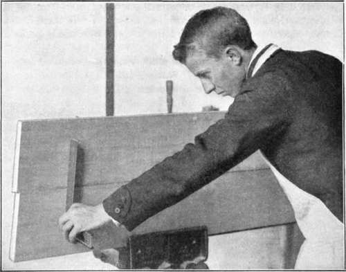 Fig. 98. Testing the Faces of the Pieces.