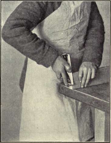 Fig. 58.   Using Block Plane upon Small Pieces.