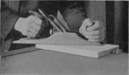 Fig. 1. Holding Wood Between Bench Pegs and Planing Surface.