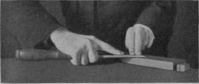 Fig. 23. Removing the Wire Edge from the Plain Side of a Chisel.