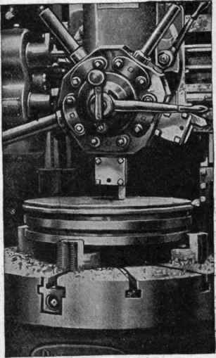 Fig. 354. Three Views of Bullard Turret Lathe in Action On Piece Shown, Time Required for Setting Tools, Turning, Chamfering, Boring, and Finishing, 80 Minutes.