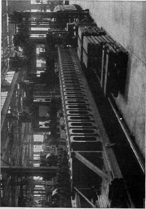 Fig. 364. Production Planer Machining 28 Columns in 12 Hours, Using Gang Tool in Each of Four Tool Heads