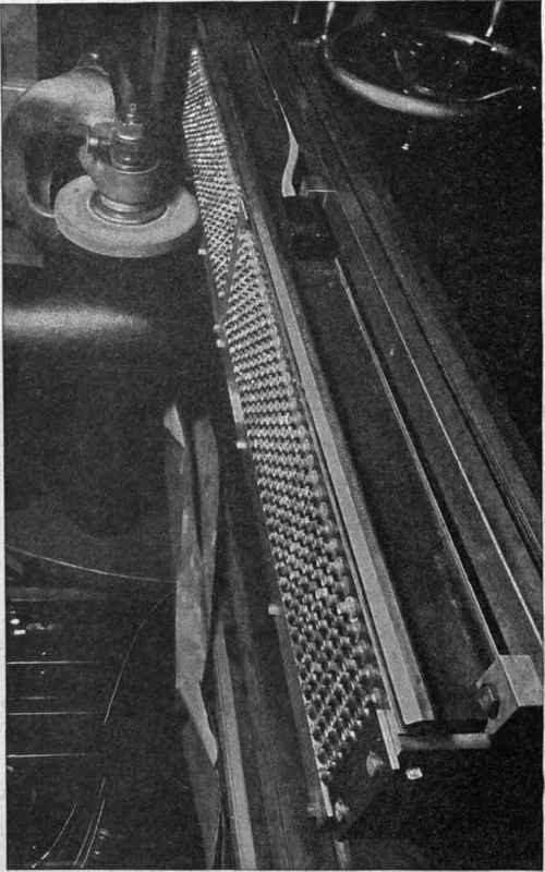 Fig. 397. Heald Magnetic Chucks Holding 528 Cones in Place for Grinding. With Ordinary Methods of Holding Work, Time