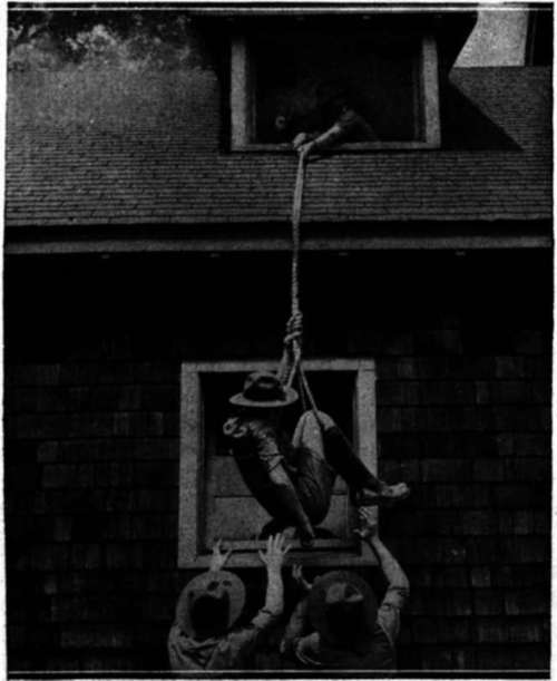 E.S.C. Scouts learn how to tie a sling