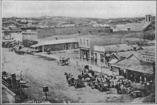 Farnam St., Omaha, 1863. Old buildings replaced by modern ones, leaving but few traces of first growth.