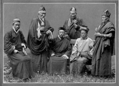 Buddhist Priests With Prayer Bells