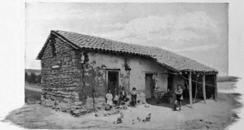 A Mexican House And Family
